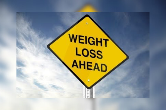 Sign Board showing “Weight Loss Ahead”