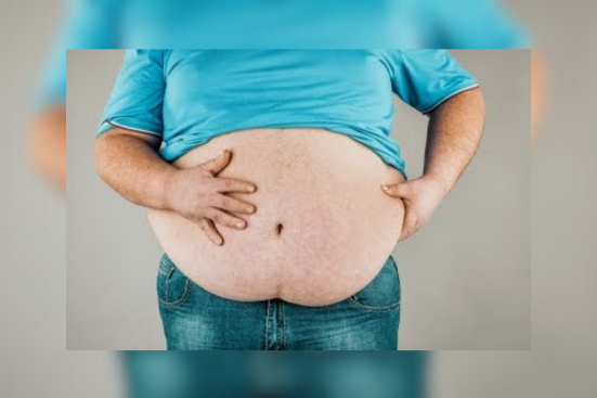  A person holding his stomach 