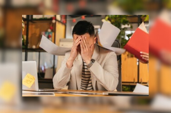 Adult man stressed due to office work