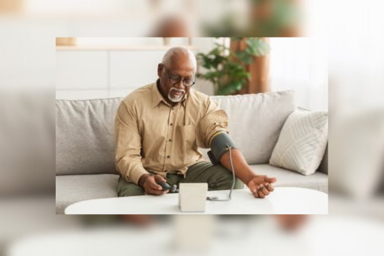 Old man measuring his Blood Pressure